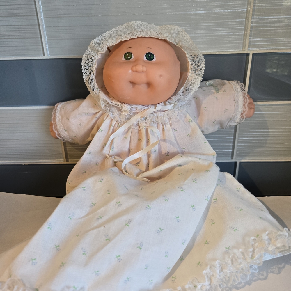 Adorable Baby Doll with White Outfit